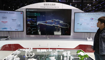 The Huawei HarmonyOS operating system is exhibited in the 2021 Shanghai auto show (Top Photo Corporation/Shutterstock)