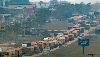 Cargo trucks stuck on national highway BR163, a key export corridor that is only partially paved (Andre Penner/AP/Shutterstock)