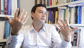 Thomas Piketty in his office, Paris, France (Witt/Sipa/Shutterstock)