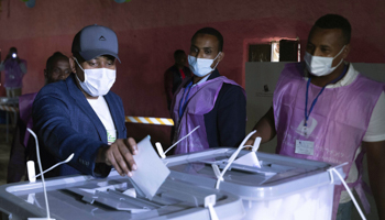 Prime Minister Abiy Ahmed casts his vote in the general election, June 21 (Mulugeta Ayene/AP/Shutterstock)