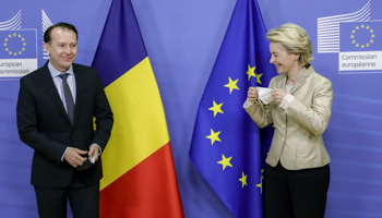 European Commission President Ursula von der Leyen welcomes Romanian Prime Minister Florin Citu to a meeting at the European Commission building in Brussels, May 11 (Olivier Hoslet/AP/Shutterstock)