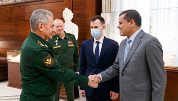 Russian Defence Minister Sergey Shoigu (L) with Libyan Prime Minister Abdul Hamid Dbeibah in Moscow, April 2021 (Uncredited/AP/Shutterstock)