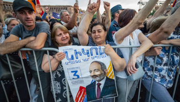 Supporters of Prime Minister Nikol Pashinyan celebrate after election results come out, June 21 (Celestino Arce/NurPhoto/Shutterstock)