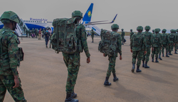 Rwandan soldiers board a plane for Mozambique, where they are deploying to fight jihadists, July 10 (Xinhua/Shutterstock)