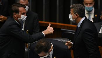 President Jair Bolsonaro (l) greets Lower House Speaker Arthur Lira (Andre Borges/NurPhoto/Shutterstock)