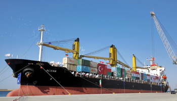 A cargo ship docked at the Chabahar port (Ebrahim Noroozi/AP/Shutterstock)