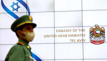 UAE guard outside the new Israeli embassy, July 2021 (Ariel Schalit/AP/Shutterstock)