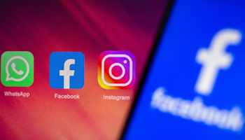 WhatsApp, Facebook and Instagram logos on a smartphone (Rafael Henrique/SOPA Images/Shutterstock)