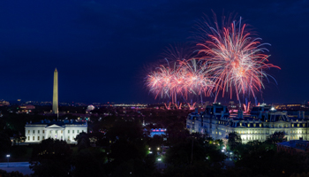 Fireworks appear over the White House and the adjacent Executive Office Building during Independence Day celebrations, July 4 (White House/News Pictures/Shutterstock)