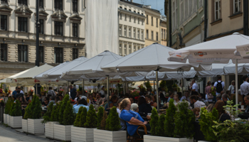 Busy restaurants in the Main Market Square in Krakow's Old Town, August 3 (Artur Widak/NurPhoto/Shutterstock)