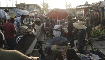 Vendors and customers are seen at the central market in Les Cayes, a week after a 7.2 magnitude earthquake hit the area (Matias Delacroix/AP/Shutterstock)