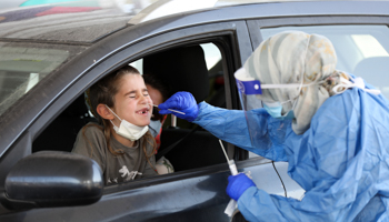 Israeli child receiving a COVID-19 test in Jerusalem, September 3 (Abir Sultan/EPA-EFE/Shutterstock)