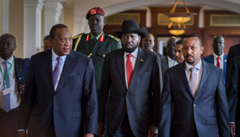 South Sudan’s President Salva Kiir arrives for IGAD-led peace talks alongside Kenyan President Uhuru Kenyatta and Ethiopian Prime Minister Abiy Ahmed, June 21, 2018 (Mulugeta Ayene/AP/Shutterstock)