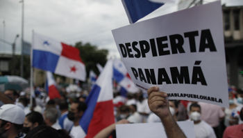 A protester shows a sign reading 'Wake Up Panama' during a demonstration in Panama City, September 14 (Bienvenido Velasco/EPA-EFE/Shutterstock)