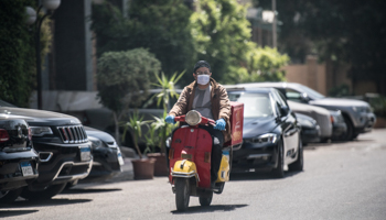 A delivery man wearing a face mask is seen in Cairo (Chine Nouvelle/SIPA/Shutterstock)