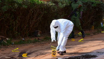 Police investigate an assassination attempt against General Katumba Wamala, June 1 (STR/EPA-EFE/Shutterstock)