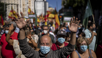 People protesting in Madrid over soaring energy prices (Manu Fernandez/AP/Shutterstock)