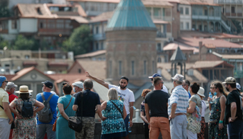 Foreign tourists in Tbilisi’s picturesque centre, August 2021 (Zurab Kurtsikidze/EPA-EFE/Shutterstock)