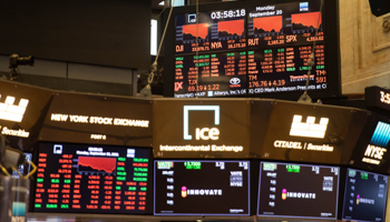 Electronic screens show trading information at the New York Stock Exchange (Xinhua/Shutterstock)