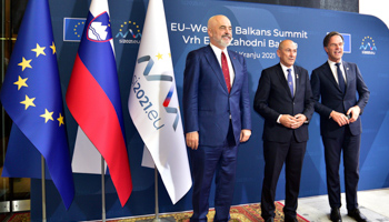 Slovenian Prime Minister Janez Jansa (C) welcomes Albanian Prime Minister Edi Rama (L) and Dutch Prime Minister Mark Rutte (R) to the EU-Western Balkans summit at Brdo, Slovenia, October 6 (Igor Kupljenik/EPA-EFE/Shutterstock)