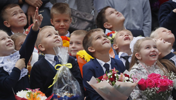 Children in Podolsk, outside Moscow, attend the traditional school year start ceremony, September 2021 (Maxim Shipenkov/EPA-EFE/Shutterstock)