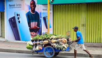 A street vendor in East Timor’s capital, Dili (Antonio Dasiparu/EPA-EFE/Shutterstock)