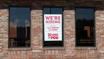 A "we're hiring" sign is seen on the window of a Wendy's fast food restaurant.
'Now Hiring' signs are seen in Bloomsburg, Pennsylvania (Paul Weaver/SOPA Images/Shutterstock)