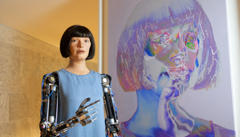 Ai-Da, the world's first Ultra-realistic AI robot artist, at the Design Museum in London (Mark Thomas/Shutterstock)