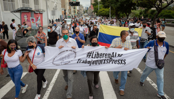 Unions demonstrate in Caracas to demand a meeting with the ICC chief prosecutor (Rayner Pena R/EPA-EFE/Shutterstock)