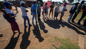 People queuing outside of polling station during South Africa's November 1 municipal election (Themba Hadebe/AP/Shutterstock)