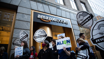 Members of the Retail, Wholesale and Department Store Union protest outside an Amazon bookshop in New York, November 10, 2021 (Karla Ann Cote/NurPhoto/Shutterstock)