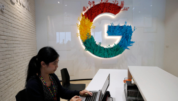 A Thai staff member at Asia's first Google Learning Center at True Digital Park in Bangkok, Thailand (Rungroj Yongrit/EPA-EFE/Shutterstock)