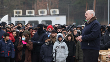 Belarusian leader Alexander Lukashenka addresses migrants near the Polish border, November 26 (Chine Nouvelle/SIPA/Shutterstock)