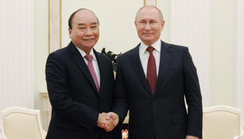 Vietnamese President Nguyen Xuan Phuc (left) shaking hands with Russian President Vladimir Putin (right) at the Kremlin late last month (Mikhail Klimentyev/Kremlin Pool/Sputnik/EPA-EFE/Shutterstock)