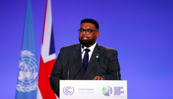 Guyana's President Irfaan Ali addressing the COP26 summit in Glasgow (Adrian Dennis/AP/Shutterstock)