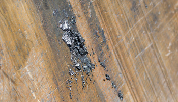 Detail of a trace of graphite in the back of a truck that transports it from a mine in China, 2017 (Dave Tacon/Zuma Wire/Shutterstock)