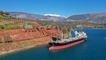 Aerial drone photo of seaside industrial bauxite mine in Greece (Shutterstock / Aerial-motion)