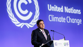 Suriname President Chandrikapersad Santokhi speaking at COP26 in Glasgow (Dominika Zarzycka/NurPhoto/Shutterstock)