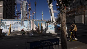A new residential project under construction in Tel Aviv, December 2, 2021 (Oded Balilty/AP/Shutterstock)