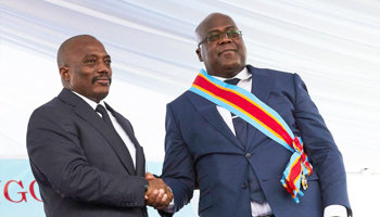 Former President Joseph Kabila congratulates President Felix Tshisekedi at his inauguration, January 24, 2019 (Hugh Kinsella Cunningham/EPA-EFE/Shutterstock)