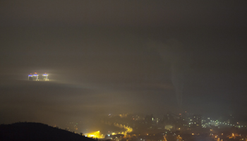 Lighted building appears though heavy fog and air pollution in the Skopje valley at night, Skopje, January 2 (Georgi Licovski/EPA-EFE/Shutterstock)