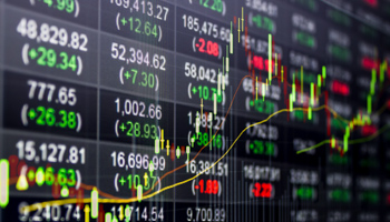 Stock market data on LED display (Shutterstock / Jirapong Manustro)