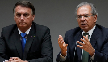 Brazilian President Jair Bolsonaro (l) and Finance Minister Paulo Guedes (Eraldo Peres/AP/Shutterstock)