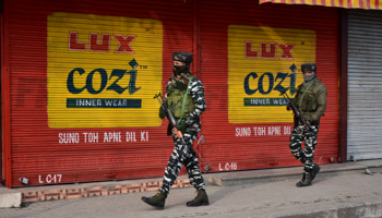 Paramilitary troops on patrol in Indian-administered Kashmir (Saqib Majeed/SOPA Images/Shutterstock)
