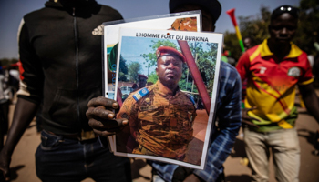 Demonstrator holds portrait of Burkinabe coup leader, Lieutenant Colonel Paul Henri Sandaogo Damiba (Sophie Garcia/AP/Shutterstock)