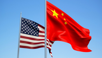 USA and China flags waving in the wind. 3d illustration (Shutterstock / Gil C)