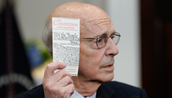 Supreme Court Justice Stephen Breyer holds a copy of the Constitution as he announces his retirement at the White House, Washington DC, January 27 (Yuri Gripas/UPI/Shutterstock)