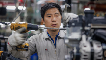 A worker at the Hyundai Mobis factory in Jiangsu province, China(Alex Plavevski/EPA-EFE/Shutterstock)