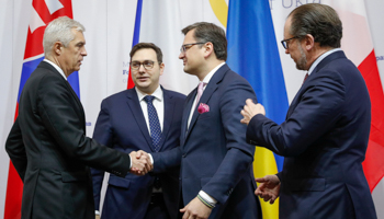 Foreign ministers Dmytro Kuleba (Ukraine; second right) shakes hands with Ivan Korcok (Slovakia; left) with Jan Lipavsky (Czech Republic; second left) and Alexander Schallenberg (Austria; right) looking on, after their joint news briefing, Kyiv, February 8 (Valentyn Ogirenko/AP/Shutterstock)
