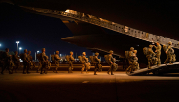 US soldiers in North Carolina board an Air Force C-17 transport aircraft for a training exercise, February 8 (EyePress News/Shutterstock)